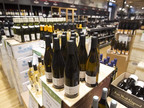 Cases of wines sit on display at the SAQ store located at Atwater Market on Tuesday December 29, 2015.