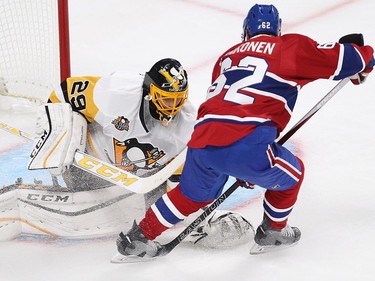 Montreal Canadiens left wing Artturi Lehkonen (62) gets in close to Pittsburgh Penguins goalie Marc-André Fleury during first period NHL action in Montreal on Tuesday October 18, 2016.