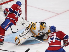 Montreal Canadiens right wing Alexander Radulov (47) scores on Pittsburgh Penguins goalie Marc-André Fleury while Montreal Canadiens right wing Brendan Gallagher (11)  skates by the goal, during third period NHL action in Montreal on Tuesday October 18, 2016.