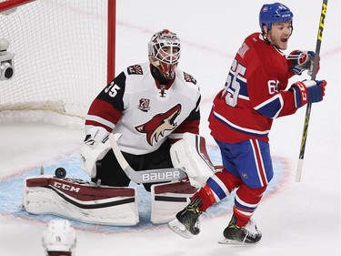 Montreal Canadiens centre Andrew Shaw (65) celebrates the goal of Alexei Emelin in front of Arizona Coyotes goalie Louis Domingue, during first period NHL action in Montreal on Thursday October 20, 2016.