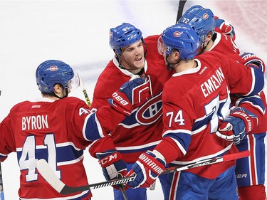 Montreal Canadiens defenceman Alexei Emelin (74) celebrates his goal with teammates Paul Byron (41), Andrew Shaw (65) and Mikhail Sergachev (22) during first period NHL action in Montreal on Thursday October 20, 2016.