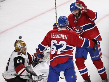 Montreal Canadiens right wing Alexander Radulov (47)  celebrates the goal by teammate Artturi Lehkonen (62) as Arizona Coyotes goalie Justin Peters is next to them, during third period NHL action in Montreal on Thursday October 20, 2016.