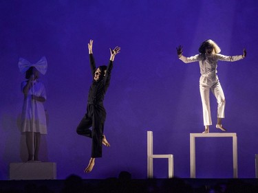 Australian musician Sia Furler, left, and dancers perform as part of her Nostalgic for the Present Tour at the Bell Centre in Montreal on Sunday, Oct. 23, 2016.