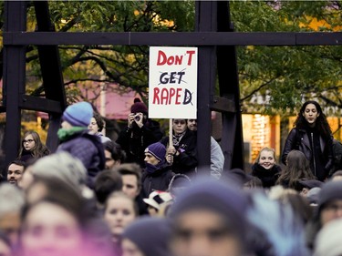 People fill Place Émilie-Gamelin in Montreal as they take part in a protest to denounce rape culture on Wednesday, Oct. 26, 2016.
