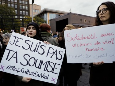 People take part in a protest to denounce rape culture at Place Émilie-Gamelin on Wednesday, Oct. 26, 2016.