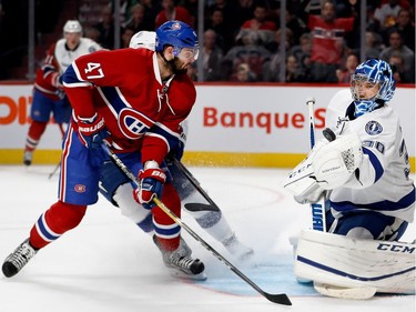 Montreal Canadiens right wing Alexander Radulov watches as Tampa Bay Lightning goalie Ben Bishop makes a glove save during NHL action at the Bell Centre in Montreal on Thursday October 27, 2016.