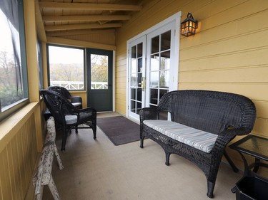 Screened-in porch outside the Montcalm cottage at Hovey Manor.