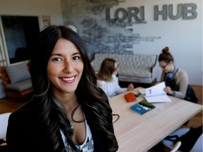 Arielle Beaudin, left, is president of Lori.biz, a think tank created to help female entrepreneurs get started in business. Maria Bond, right, gets algebra tutoring help from Mira Katz in a common area of their office in Montreal on Thursday September 29, 2016.