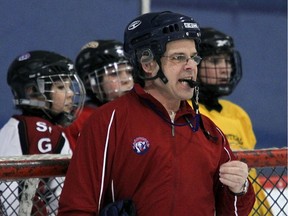 Lakeshore peewee AA hockey coach Louis Isabella runs his team through drills at practice at the Beaconsfield Arena in Beaconsfield, west of Montreal, March 3, 2011.                (