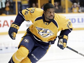 In this Oct. 1, 2016, file photo, Nashville Predators defenceman P.K. Subban warms up before an NHL hockey preseason game against the Tampa Bay Lightning, in Nashville, Tenn. His new teammates with the Nashville Predators believe the defenceman will fit in perfectly in Music City, a town built on entertainment and a nontraditional hockey market filled with enthusiastic fans who love a great show.