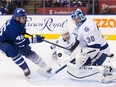Tampa Bay Lightning goalie Ben Bishop makes a save against Toronto Maple Leafs defenceman Roman Polak during second period NHL hockey action in Toronto on Tuesday, October 25, 2016.