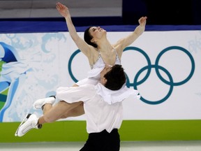 Canada's Tessa Virtue and Scott Moir perform their free dance in the ice dance competition at the 2010 Vancouver Olympic Winter Games in Vancouver on February 22, 2010. When Tessa Virtue watched Derek Drouin soar to a high jump gold medal this past summer in Rio, the connection she felt went beyond being a fellow Olympic champion. In the weeks after Rio, Drouin revealed he had competed through a stress fracture in his back, a persevering-through-pain theme that also ran through Virtue's gold medal performance at the 2010 Vancouver Olympics.