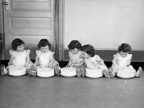 The second birthday of the Dionne quintuplets. May 28, 1936, left to right: Yvonne, Annette, Cecile, Emilie and Marie.