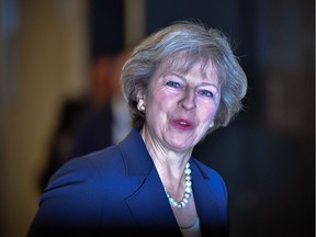 British Prime Minister Theresa May said Sunday that Britain would trigger the formal process for leaving the European Union before April.