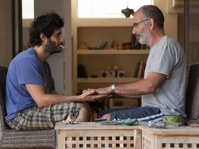 Tomer Kapon and Shai Avivi in a scene from Asaph Polonsky's One Week and a Day, which screens as part of the Festival du nouveau cinéma.