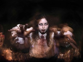 People take part in a Zombie Walk along the main streets of San Jose, Costa Rica. Quebec medical students will hold a walk Oct. 31, 2016.