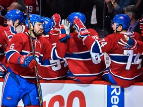 Canadiens' Shea Weber (6) celebrates his third period goal with teammates on the bench against the Toronto Maple Leafs at the Bell Centre on Saturday, Oct. 29, 2016, in Montreal.