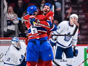 Shea Weber (6) of the Montreal Canadiens celebrates his third- period goal with teammate Alexander Radulov (47) against the Toronto Maple Leafs at the Bell Centre on Oct. 29, 2016, in Montreal.
