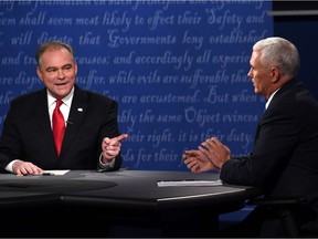 Republican candidate for Vice President  Mike Pence (R) and Democratic candidate for Vice President Tim Kaine speak during the vice presidential debate at Longwood University in Farmville, Virginia on October 4, 2016.