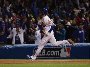 Kris Bryant (#17) of the Chicago Cubs rounds the bases after hitting a home run in the fourth inning against the Cleveland Indians in Game Five of the 2016 World Series at Wrigley Field on October 30, 2016 in Chicago, Illinois.