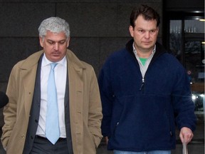Jeremy Morris, right, leaves the Montreal courthouse with his lawyer, Daniel Lighter, in Montreal on Tuesday, March 12, 2013.
