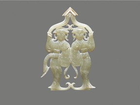 A jade pendant with two female dancers, from China's Han dynasty (206 BCE to 220 CE) from the exhibition  From the Lands of Asia: The Sam and Myrna Myers Collection at Pointe-à-Callière museum.