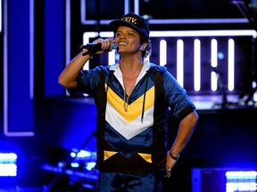 Bruno Mars performs during the American Music Awards in Los Angeles on Nov. 20, 2016.