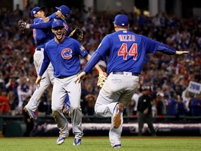 Kris Bryant and Anthony Rizzo of the Chicago Cubs celebrate after defeating Cleveland 8-7 in Game Seven of the 2016 World Series Nov. 2, 2016 in Cleveland. The Cubs won their first World Series in 108 years.