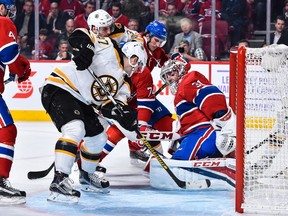 Carey Price #31 of the Montreal Canadiens makes a save near Torey Krug #47 of the Boston Bruins during the NHL game at the Bell Centre on November 8, 2016 in Montreal, Quebec, Canada.
