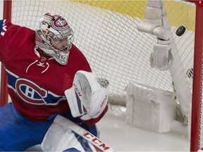 Montreal Canadiens goalie Carey Price watches the puck sail into the net from a shot by Ottawa Senators' Mark Stone, not shown, during third period NHL hockey action in Montreal, Tuesday, November 22, 2016.