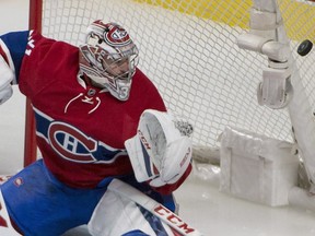 Montreal Canadiens goalie Carey Price watches the puck sail into the net from a shot by Ottawa Senators' Mark Stone, not shown, during third period NHL hockey action in Montreal, Tuesday, November 22, 2016.