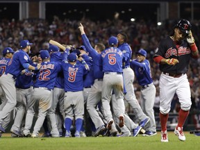 Chicago Cubs celebrate after Game 7 of the Major League Baseball World Series against the Cleveland Indians Thursday, Nov. 3, 2016, in Cleveland. The Cubs won 8-7 in 10 innings to win the series 4-3.