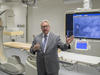 Quebec Health Minister Gaétan Barrette in an angiography scanning room on Monday: The new clinical and research wings have increased Ste-Justine Hospital's surface area by 65 per cent.