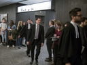 Former Montreal Mayor Michael Applebaum, centre, arrives with his lawyer Pierre Teasdale, rear, for his corruption trial at the Montreal Courthouse on Monday, November 14, 2016. 