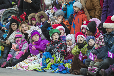 Children watch the annual Santa Claus Parade on Ste-Catherine street in downtown Montreal on Saturday, November 19, 2016.