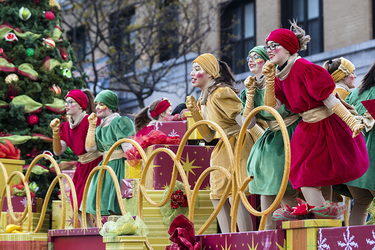 Performers dance during annual Santa Claus Parade on Ste-Catherine street in downtown Montreal on Saturday, November 19, 2016.