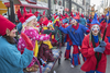 Performers greet children at the annual Santa Claus Parade on Ste-Catherine street in downtown Montreal on Saturday, November 19, 2016.