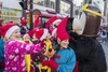 Leanea Marsolais, left, and Genevieve Tremblay watch the annual Santa Claus Parade on Ste-Catherine street in downtown Montreal on Saturday, November 19, 2016.