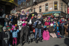 Children and adults watch the annual Santa Claus Parade on Ste-Catherine street in downtown Montreal on Saturday, November 19, 2016.