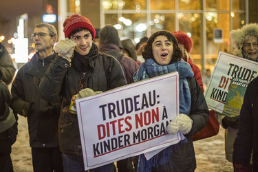 Demonstrators take part in a vigil against the British Columbia Kinder Morgan pipeline expansion in Montreal on Monday, November 21, 2016. The $6.8-billion Kinder Morgan's Trans Mountain pipeline expansion project would ship oil from Alberta’s oil sands to British Columbia through Vancouver’s harbour.