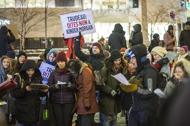 Demonstrators take part in a vigil against the British Columbia Kinder Morgan pipeline expansion in Montreal on Monday, November 21, 2016. The $6.8-billion Kinder Morgan's Trans Mountain pipeline expansion project would ship oil from Alberta’s oil sands to British Columbia through Vancouver’s harbour.