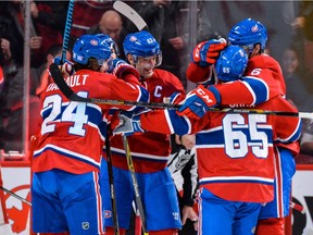 Phillip Danault (24) of the Montreal Canadiens celebrates his goal with teammates during the NHL game against the Detroit Red Wings at the Bell Centre on Nov. 12, 2016, in Montreal.