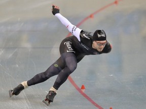 The Canadian men's long-track speedskating team of Laurent Dubreuil of Lévis (shown here in a 2014 file photo), Vincent de Haître of Cumberland, Ont., and Montreal's Christopher Fiola finished first in one minute 20.52 seconds in the sprint event at the Nagano World Cup on Saturday, Nov. 19, 2016.