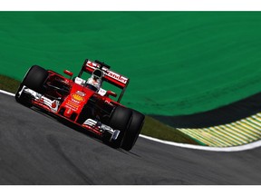 Germany's Sebastian Vettel steers his Ferrari during practice for the Formula One Grand Prix of Brazil at Autodromo Jose Carlos Pace in Sao Paulo, Brazil.