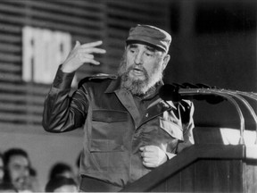 Fidel Castro delivers a speech during the inauguration of work at a hospital in Havana on December 30, 1988.