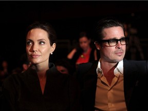 Angelina Jolie and Brad Pitt at the Global Summit to End Sexual Violence in Conflict in London in June 2014.