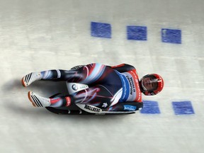 Germany's  Natalie Geisenberger speeds down the track to win  the women's  luge world cup in Winterberg, Germany, Saturday Nov.26, 2016.