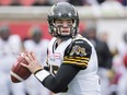 Hamilton Tiger-Cats quarterback Jeff Mathews throws a pass during first half CFL action against the Montreal Alouettes in Montreal, Sunday, October 18, 2015.