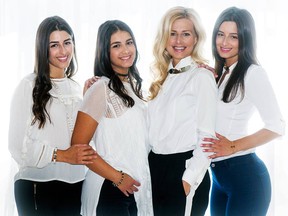 Jewelry designer Katherine Karambelas, second right, poses with her daughters, from left, Faith, Maria-Anna and Nektaria, at her home in Laval.