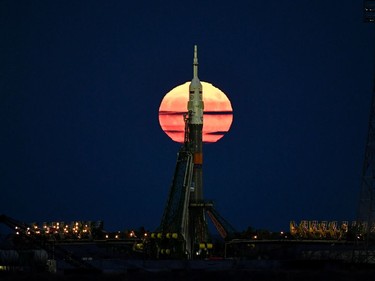 The supermoon is seen behind the Soyuz MS-03 spacecraft set on the launch pad at the Russian-leased Baikonur cosmodrome in Kazakhstan on November 14, 2016.